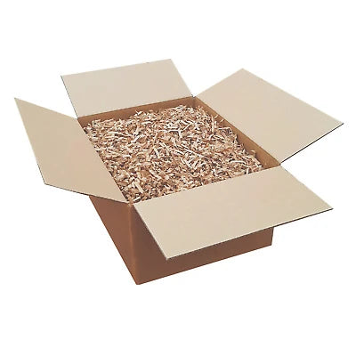 Shredded cardboard in a cardboard box made by a CushionPack Cardboard Shredder
