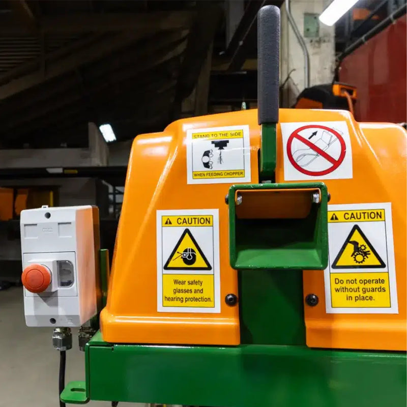 closeup of a Sweed CE300 strapping chopper machine in a warehouse