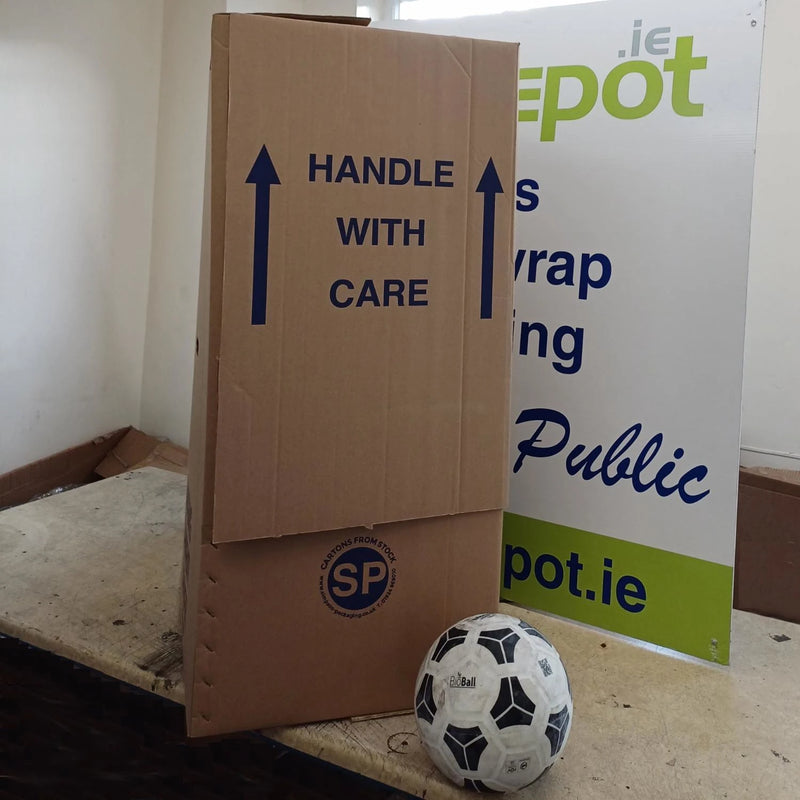 A wardrobe box beside a football to give size perspective