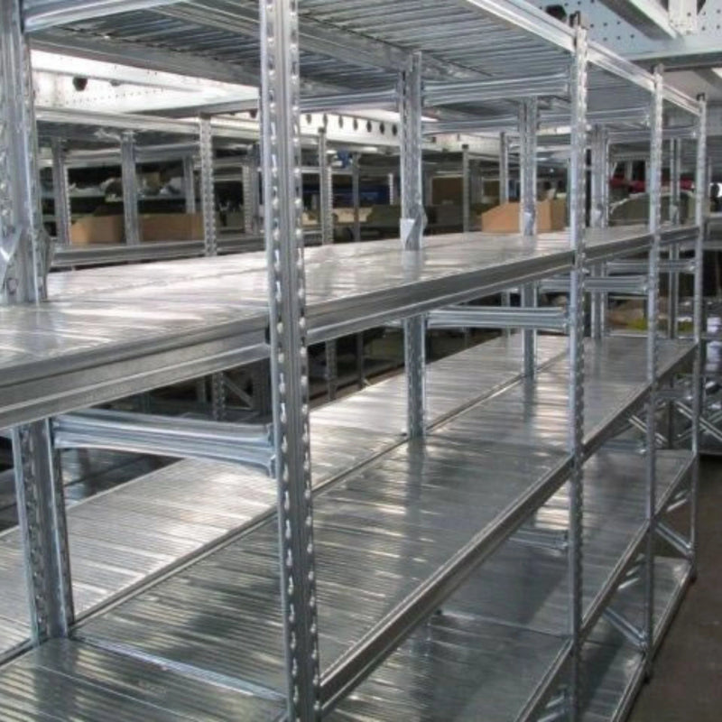 empty boltless steel shelving in a warehouse environment
